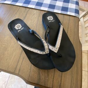 Black yellow box flip flops